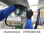 Temperature transmitter during install the power cable for measuring in steam system in gas pipeline.