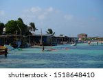 Small photo of Jibe City, Bonaire - 01/01/2018: Shore view with partially cloudy sky of Jibe City windsurfing in Bonaire