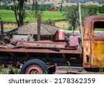 An Old Rusty Truck And Flatbed...