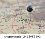 Small photo of Cortez, Colorado marked by a yellow map tack. The City of Cortez is the county seat of Montezuma County, CO.