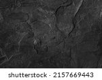 Dark grey black slate background or texture. Black granite slabs background.                             