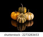 4 Pumpkins With Their...
