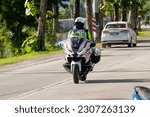 Small photo of Langkawi, Kedah - May 23 2023: A Military Police outrider driving down the streets of Langkawi.
