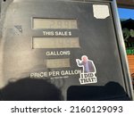 Small photo of McGregor, Minn. US - May 13, 2022 : A sticker mocking President Joe Biden points towards current fuel prices on a gas station pump. 2484