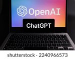 Small photo of ChatGPT logo seen on smartphone and laptop display with blurred OpenAI company logotype. AI chatbot by OpenAI. Stafford, United Kingdom, December 20, 2022.