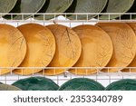 Small photo of Ceramic plates with imprints of real leaves.