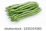Small photo of Organic Fresh raw string bean or french beans or Phaseolus vulgaris or common bean or buncis on white background.