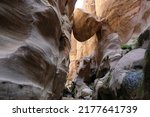 Dana Biosphere Reserve in Jordan. Hanging rock in Wadi Ghuweir Canyon. 