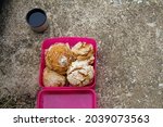 Small photo of Asceticism picnic with roll bread on stone