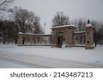 Small photo of OBERLIN, OHIO, USA - JANUARY 02, 2014: The Memorial Arch on Tappan Square, on N Professor St, during a snowstorm.