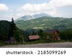 Small photo of Paraul Rece, ROMANIA - MAY 28, 2014: View of Mountains, from Pensiune Dor de Munte, on National Road DN73A, the road from Predeal to Rasnov.