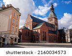 Small photo of Riga, Latvia, 14 October 2021: Cathedral Church of Saint Mary, seat of the Archbishop, Evangelical Lutheran Dome cathedral with tower and weathercock, old town at sunny day