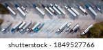 Small photo of Truck stop on Rest area On the highway. Top view car parking lot. Truck Driver company. View from the bird's flight. Aerial photography. Copy space.