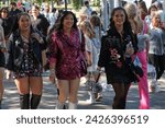 Small photo of Melbourne, Victoria, Australia. 02-16-2024. sequins, glitter and cowboy boots as everyone dress's up for the Taylor Swift ERAS Tour at Melbourne's MCG