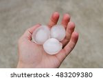 Hail ice in hand after a heavy storm