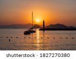 Lighthouse At Sunset In...