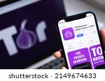 Small photo of SPB, Russia - April 15, 2022: Tor Browser with VPN app. Icon closeup. Smartphone in hand with private and safe browser, VPN application