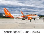 Small photo of EasyJet commercial aircraft parking at the airport in Split, Croatia. EasyJet airlines Airbus. Splin, Croatia - 21.05.2021