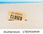 Closed Sign On Tropical Sand...