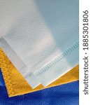 Small photo of Nonwoven Polypropylene Spunbond Blue Fabric with different colors Texture background. This Fabric Can be Use for ECO Friendly Bags Making.