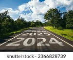 New year 2024 to 2026 written on the road in the middle of asphalt road, Planing of new year concept.