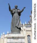 Small photo of MADRID, SPAIN - CIRCA JUNE 2015: statue of pope John Paul II with his Latin motto Totus Tuus (translated " Totally thine ")
