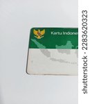 Small photo of Makassar, Indonesia, April 2, 2023: Kartu Indonesia Sehat (Health Insurance card from the Government of Indonesia) under the auspices of the BPJS kesehatan Isolated on white background