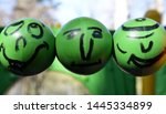 funny faces  on  green balls | Shutterstock . vector #1445334899