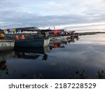 Small photo of August 7, 2022, in Surakarta, Central Java, Indonesia. some boats are docked in the afternoon and ready to fish tonight