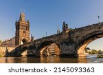 Small photo of Prague - beautiful old Charles bridge, view from river Vltava, Czech Republic.The oldest bridge in Prague was built on the site of Judith's Bridge.