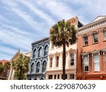Small photo of Colorful row of houses on Broad Street, in the historical district of Charleston, SC.