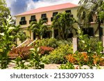 Small photo of Sunbury Plantation House, Barbados. Restored great house from gentry time of the island's sugar barons. Built in the 1600s by Matthew Chapman an early settler. Front exterior, porch, jalousie shutters