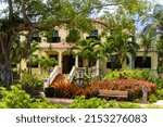 Small photo of Sunbury Plantation House, Barbados. Restored great house from gentry time of the island's sugar barons. Built in the 1600s by Matthew Chapman an early settler. Front exterior, porch, jalousie shutters