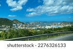 Small photo of Sint Maarten, Simpsons Bay, Cole Bay, Simpsons Bay Lagoon, and Snoopy Island. Saint Martin (French: Saint-Martin; Dutch: Sint Maarten) A Caribbean island belonging to both France and the Netherlands.