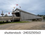 Small photo of Hartland, New Brunswick -Jun 1, 2023: The Hartland Covered Bridge is the world's longest covered bridge. It crosses the Saint John River from Hartland to Somerville, New Brunswick, Canada.