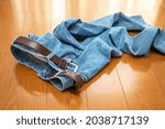 Jeans thrown off on the floor