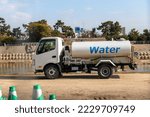 A Water Truck Waiting At The...