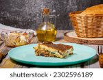 Small photo of Traditional greek moussaka with eggplants, ground beef and potatoes