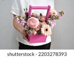 Flowers In A Hat Box. Woman...