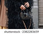 Small photo of Paris, France - January 25, 2023: fashioner wearing Gucci Jackie shoulder bag. Fashion blogger outfit details, street style