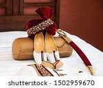 Small photo of Indian Groom wedding sward and khussa shoes with sharwani dress