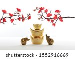Small photo of Chinese New Year decoration on white background Flowers of good fortune and lump of gold. (Chinese characters . FU. in the Chinese gold article refer to good luck, wealth, money flow)