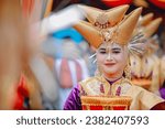 Small photo of Photos of the wedding ceremony of the Minangkabau tribe from West Sumatra, Indonesia wearing traditional clothes typical of the Minangkabau tribe in 24 oktober 2023