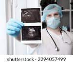 Small photo of Doctor with a stethoscope in the office in the clinic, analyzes the disease of the genitourinary system in men. Ultrasound of the ureter with a calculus of 8 mm, the calculus is stuck in the ureter