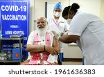 Small photo of The Prime Minister, Shri Narendra Modi takes second dose of the COVID-19 vaccine, at AIIMS, New Delhi on April 08, 2021