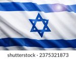 Small photo of Israel flag. Independence Day of Israel. Israel flag beautifully waving wave with star of David over white wooden background. National pride of Israel. Patriotism and commonwealth. Top view. Mock up.