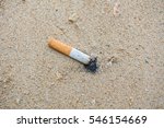Cigarette On Sand Beach...