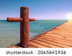 A Corroded Jetty On A Seaside...