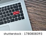 Small photo of Hate speech key on red keyboard buttons representing online defamatory comments