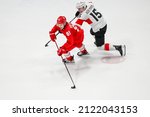 Small photo of BEIJING, CHINA - FEBRUARY 09: Gritsyuk Arsen (L) of ROC and Hofmann Gregory of Switzerland at Men's Preliminary Round Group B match of the Beijing 2022 Winter Olympic Games